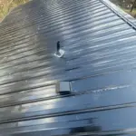 He Won a FREE Roof—You Can Too! 9 Glossy black metal roofing on sweepstake winner's roof in Blacksburg, SC.