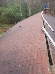 Before photo of sweepstakes winner roofing prior to new metal roof installation.