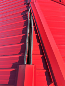 A bright red waterproof metal roof