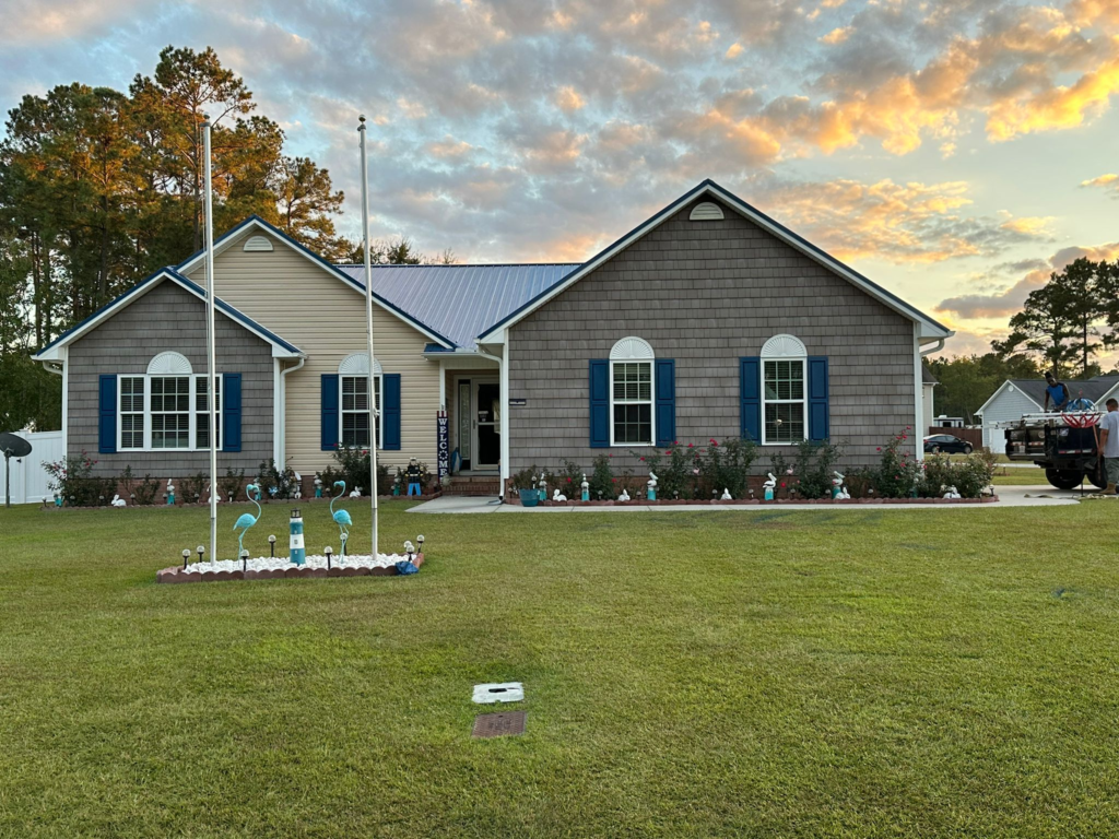 A house with a blue metal roof