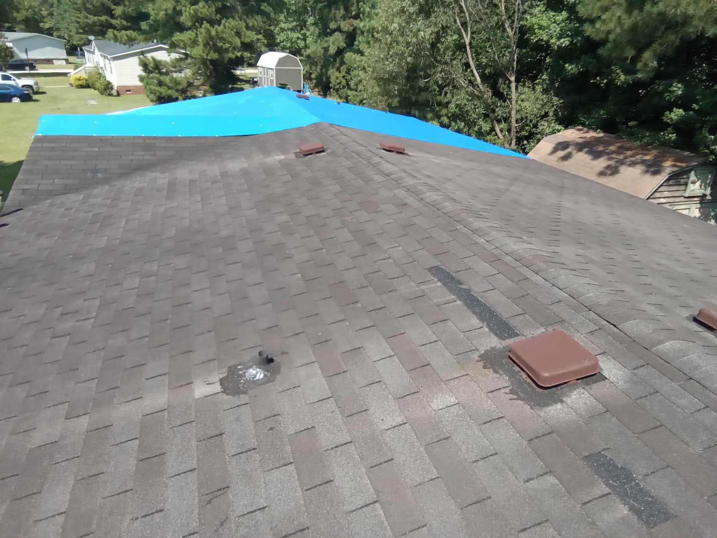 Metal roof installation in progress