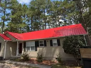Completed installation of Gator's Brite Red metal roofing in Aberdeen, NC.