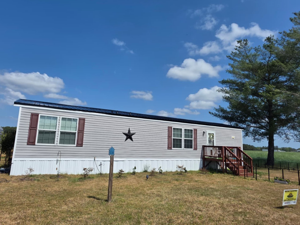 Black metal roofing on a mobile home in North Carolina.