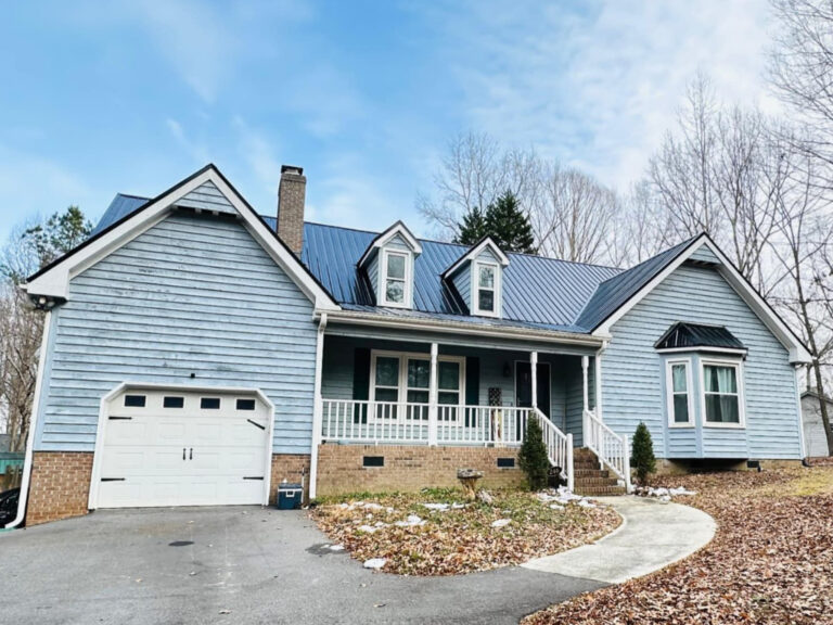 Curbside view of Gator Metal Roofing installed in black on a home in Garner, NC