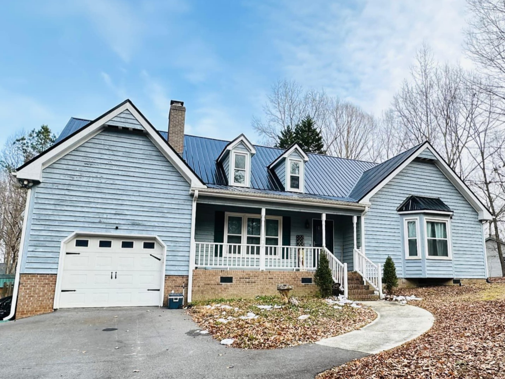 Curbside view of Gator Metal Roofing installed in black on a home in Garner, NC