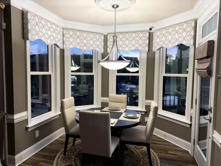 Post installation view of a breakfast nook with the HeatShield 5000 Double Hung Windows in Mount Pleasant, SC.