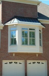 Energy efficient and highly durable windows from Gator Metal Roofing installation.