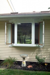 Same day estimates on bay window installation by Gator Metal Roofing.