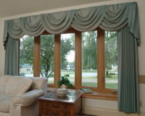Wood-grain bow windows from Gator Metal Roofing available for installation in NC and SC.