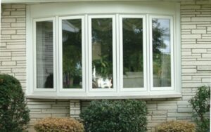 Bow windows in white from Gator Metal Roofing.