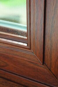 Wood-grain casement windows available at Gator Metal Roofing for Carolinas homeowners.