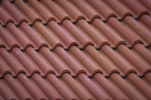 A brown colored metal roof of a house.