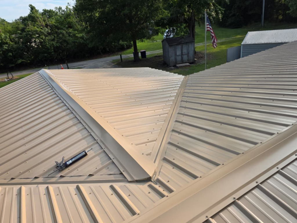 Tan metal roofing installation in Maysville, SC.