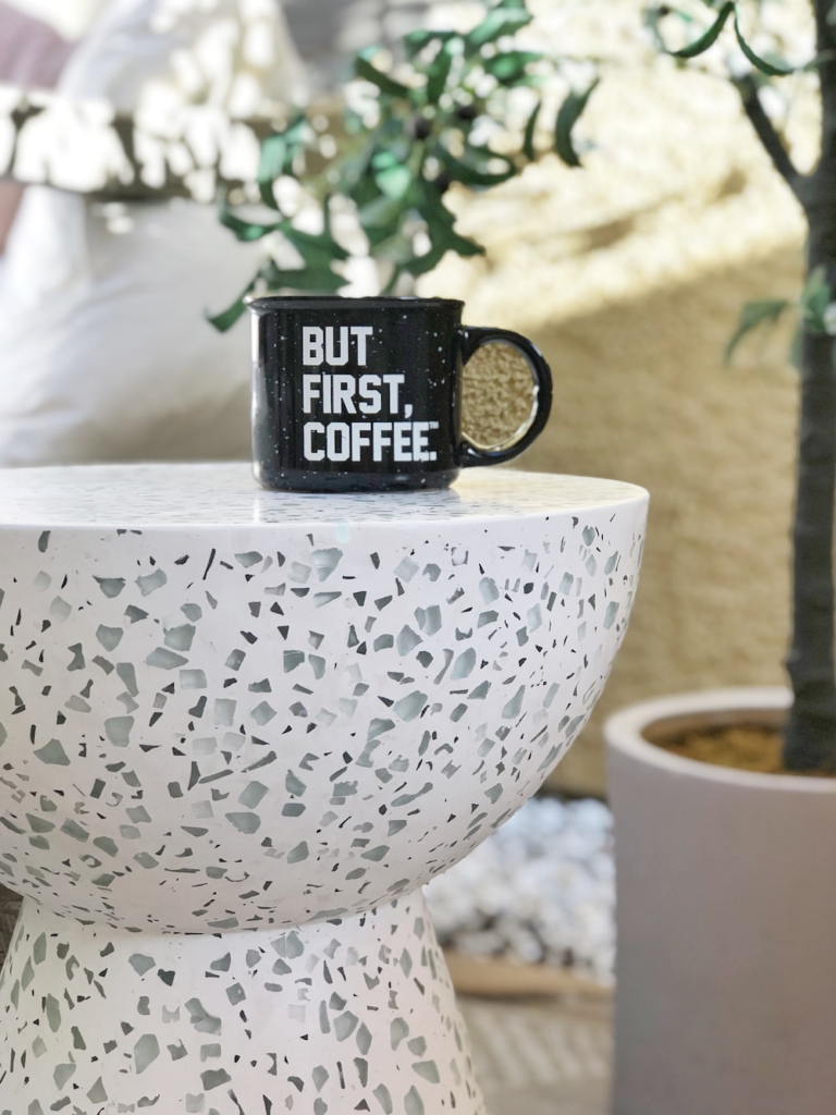 a mug placed on a terrazzo surface.